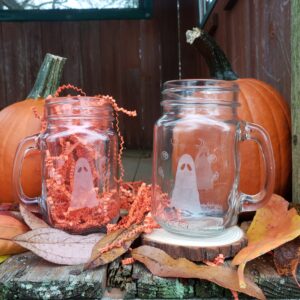 Flukelady's haunted refreshments ghost mugs in a fall setting.