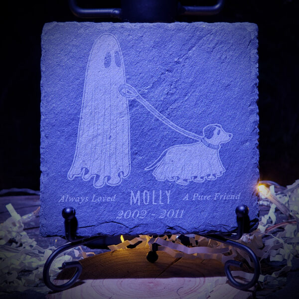 A customized slate tile featuring a ghost and its dog on a walk.