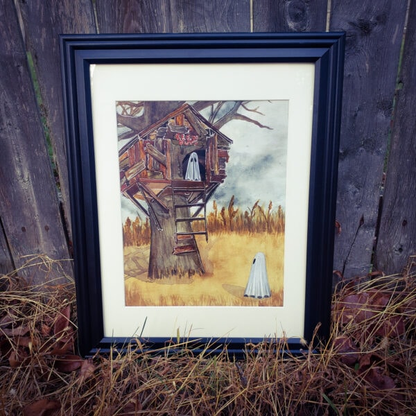 Treehouse Ghost Painting in a frame, staged outdoors