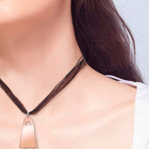 Sheer ghost necklace, worn by a female model.