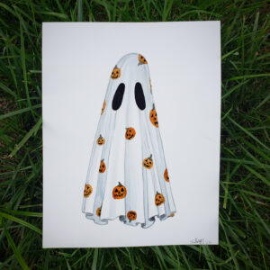 A photo of 'Pumpkin Pattern Ghost', an original watercolor painting by Flukelady. It depicts a sheet ghost standing before a white background, the sheet is clad in a pumpkin pattern print.