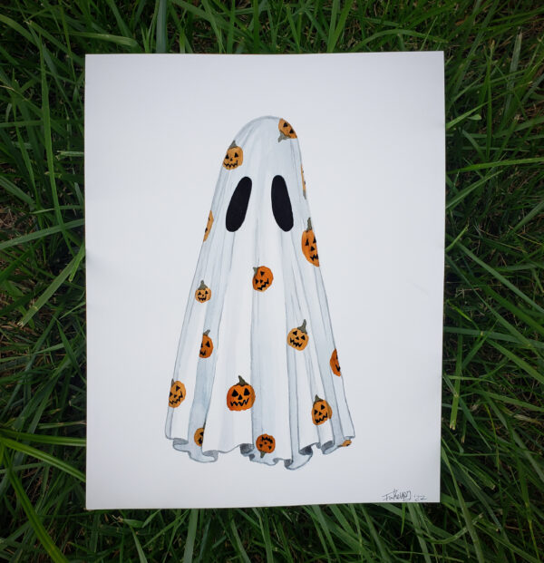 A photo of 'Pumpkin Pattern Ghost', an original watercolor painting by Flukelady. It depicts a sheet ghost standing before a white background, the sheet is clad in a pumpkin pattern print.